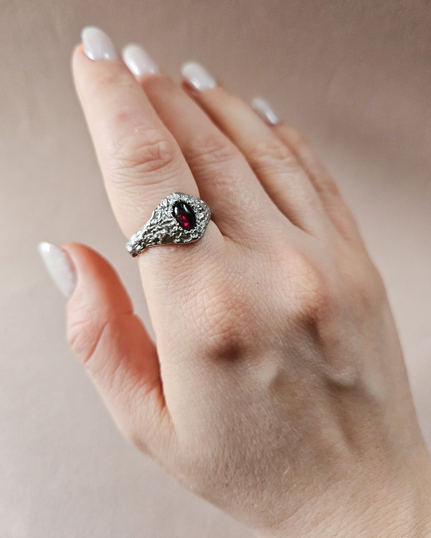 Rustic ring with garnet stone