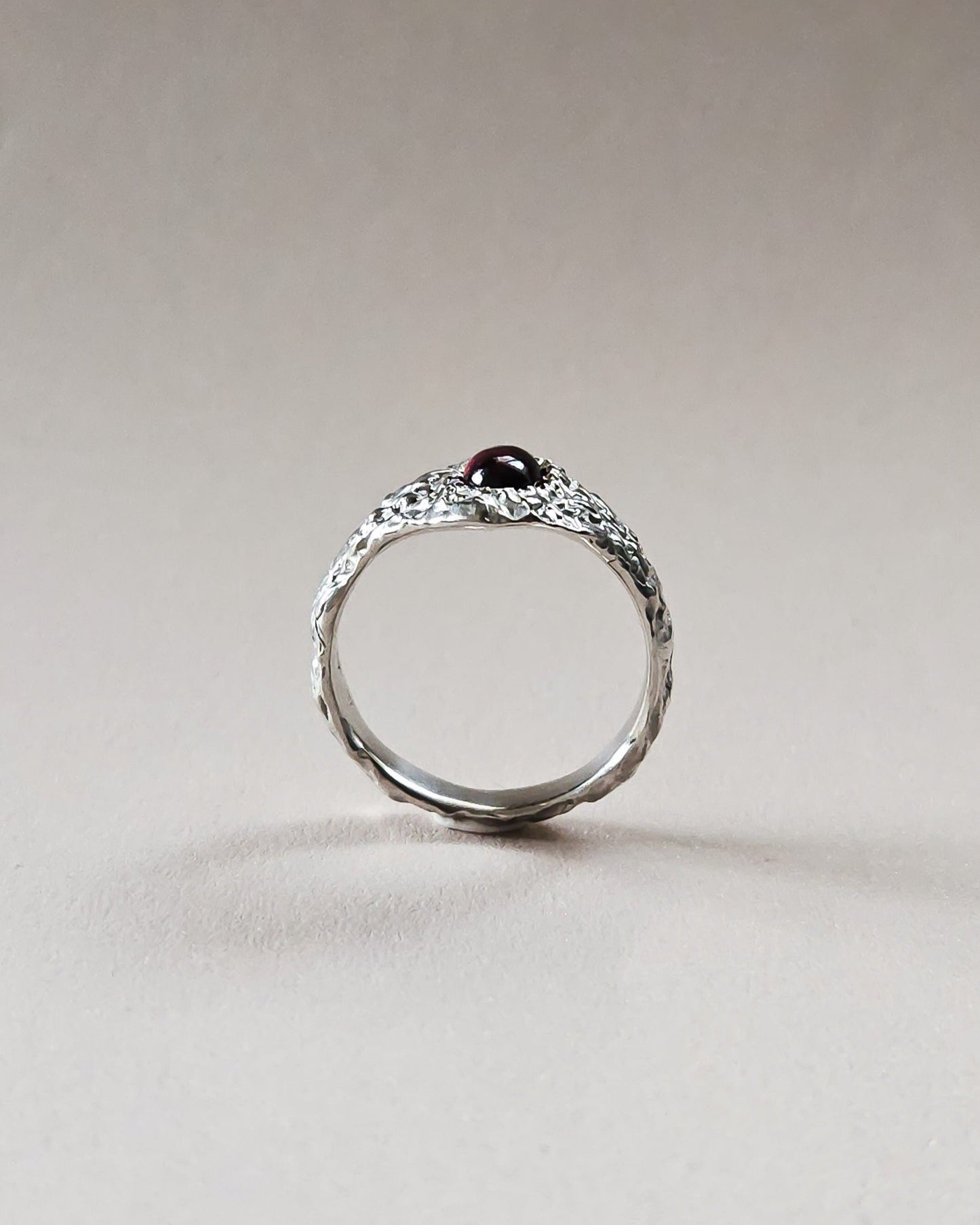 Rustic ring with garnet stone
