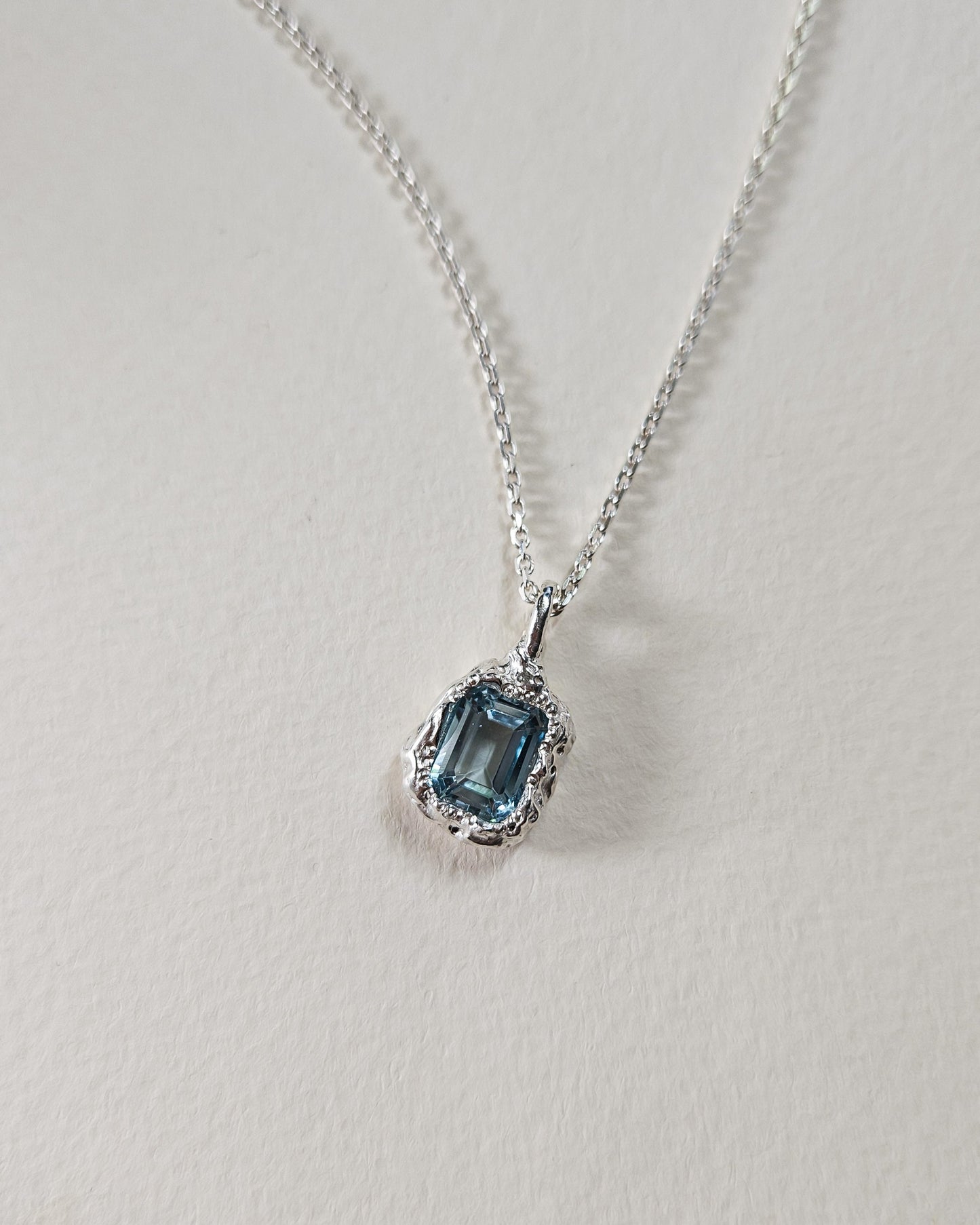 Rhea pendant with topaz