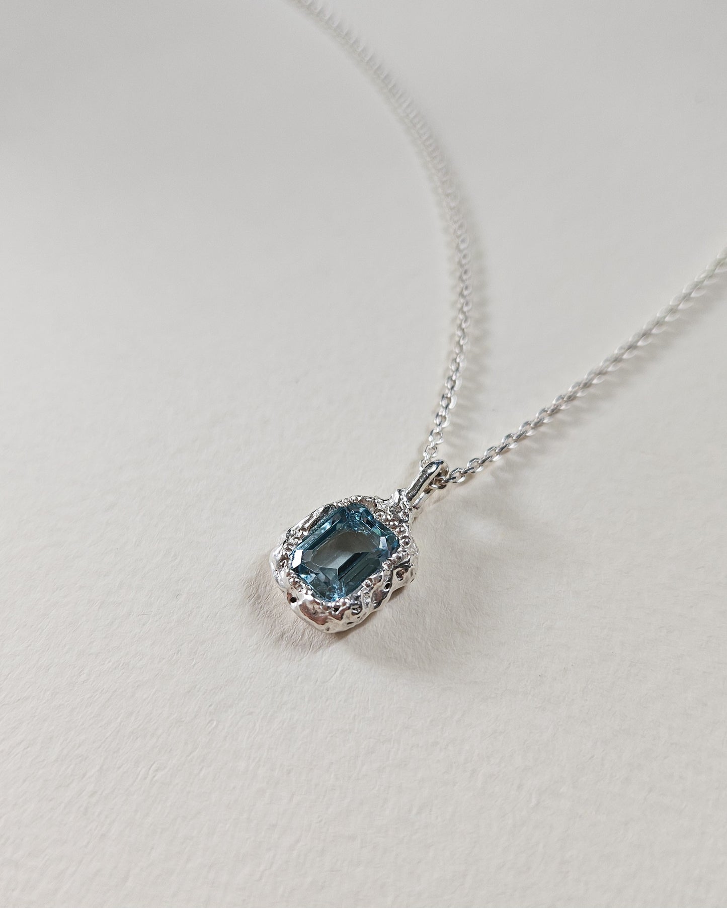 Rhea pendant with topaz
