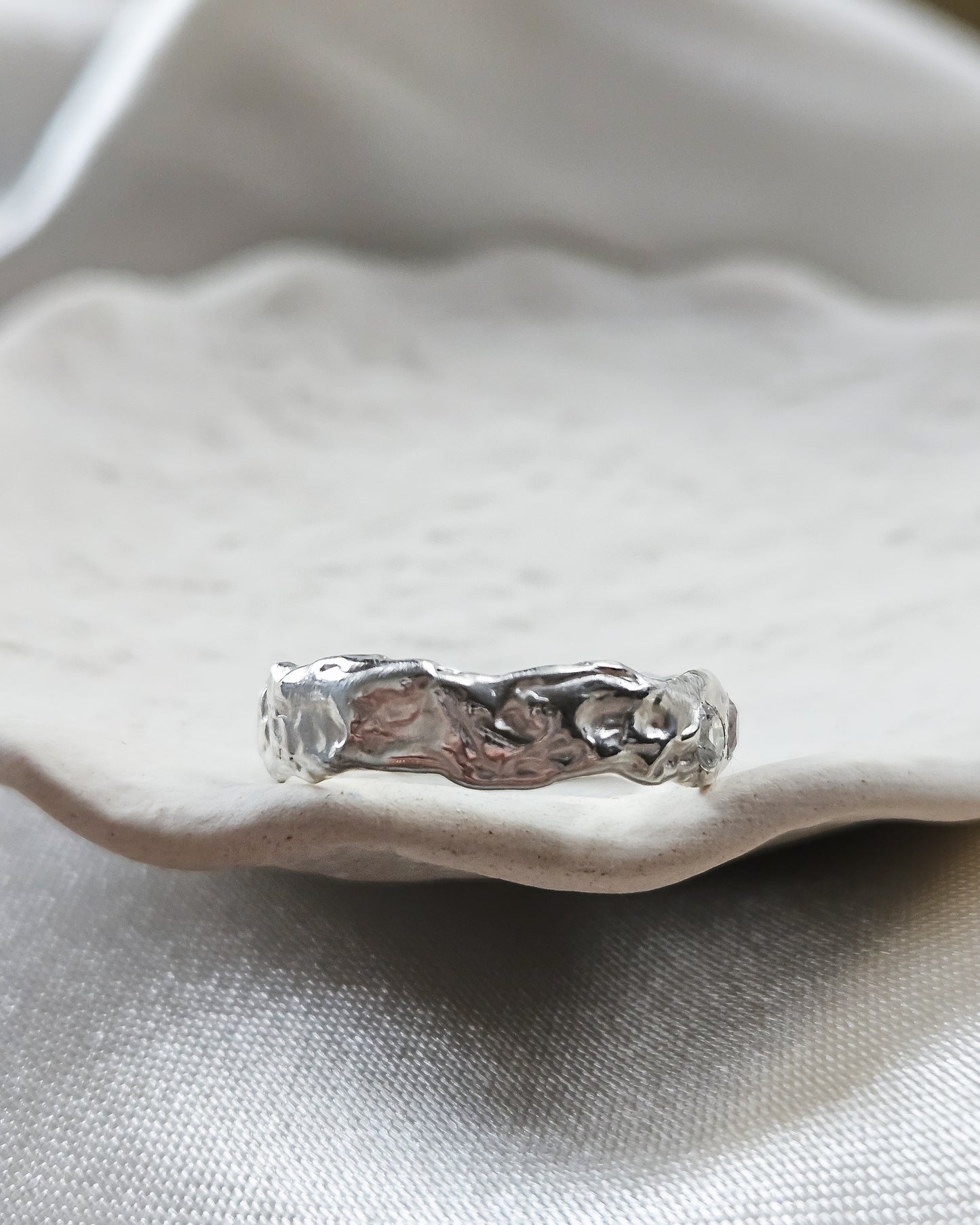 Melted ring with pink sapphires