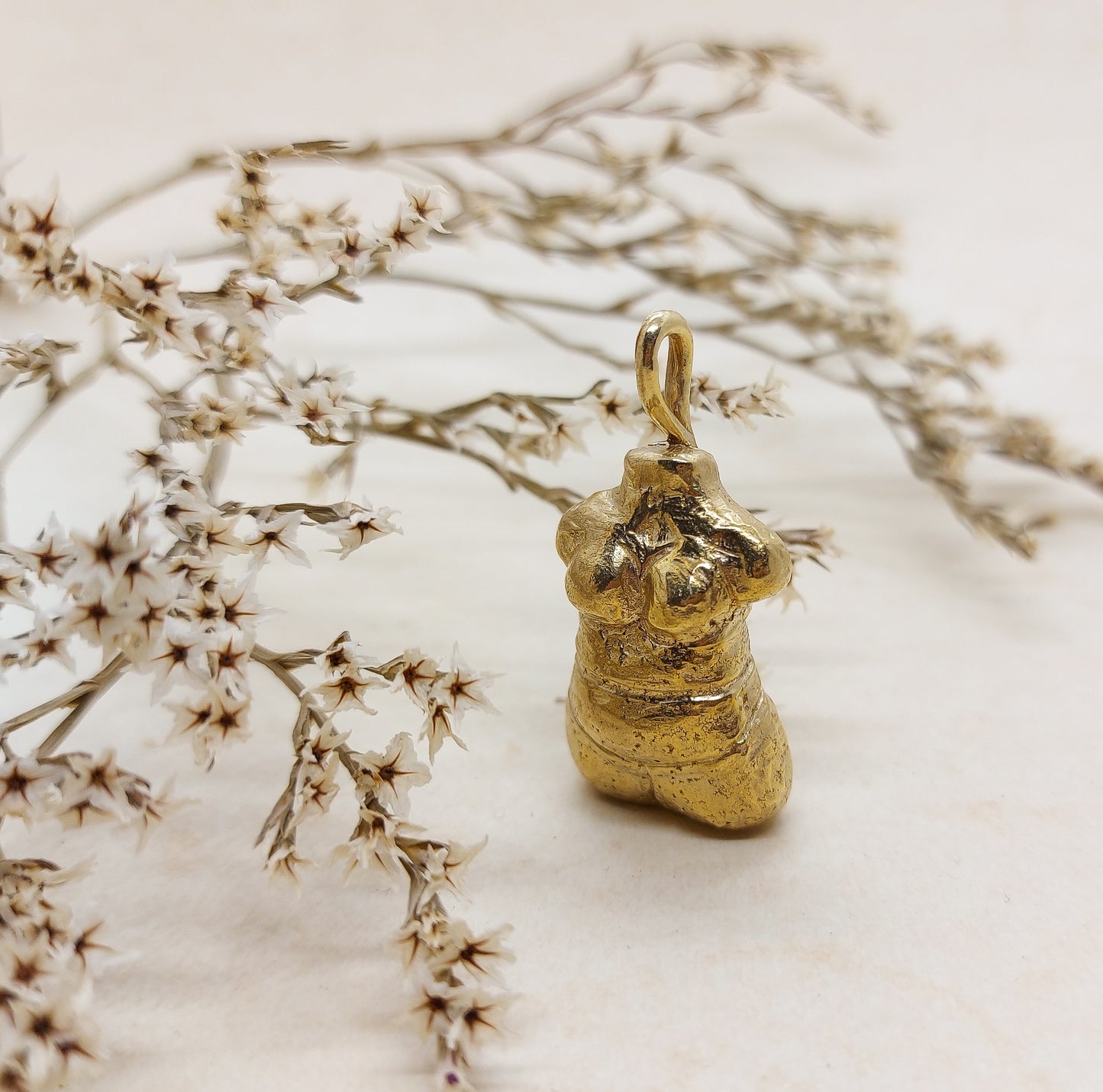 woman shaped pendant