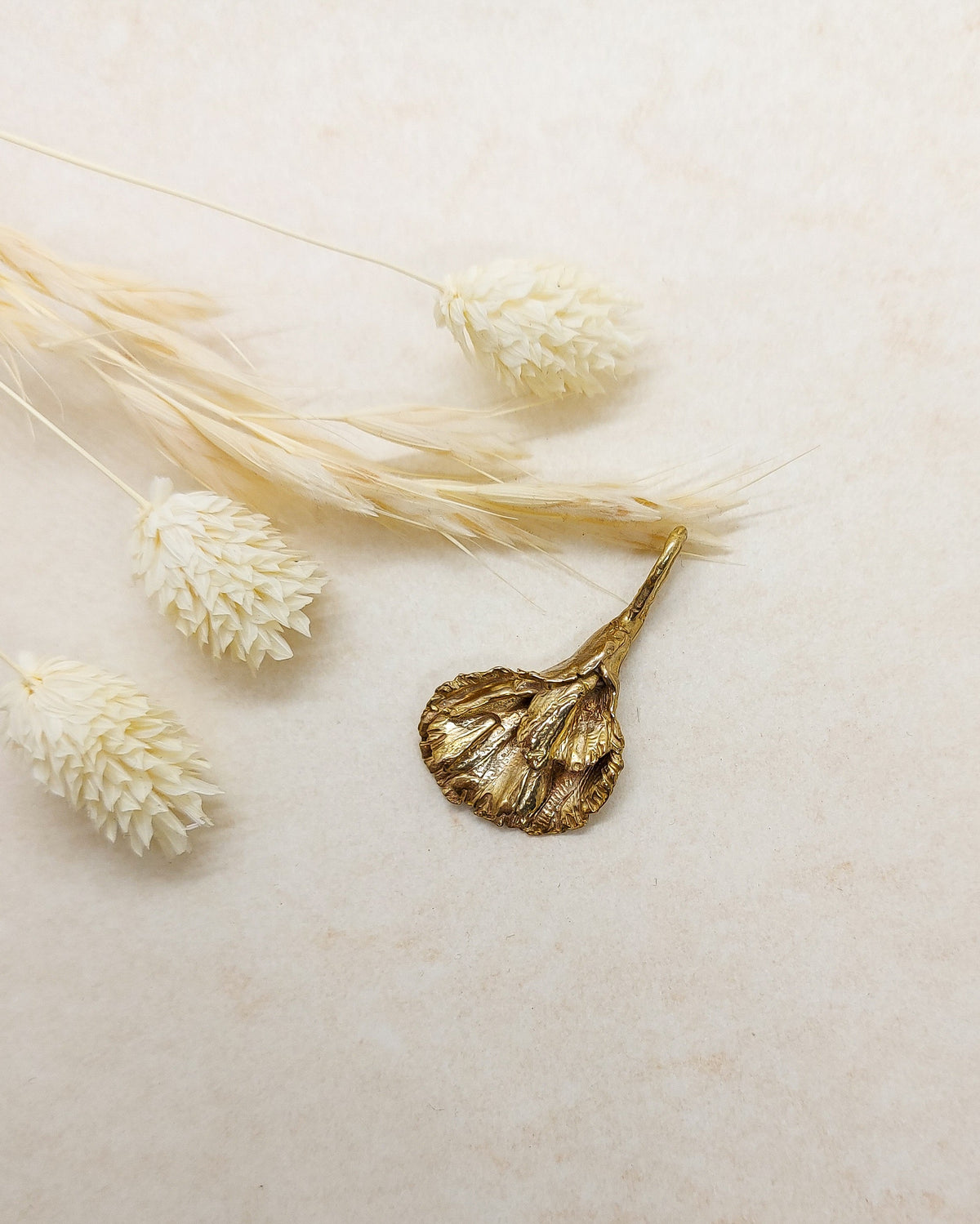 pendant representing femininity