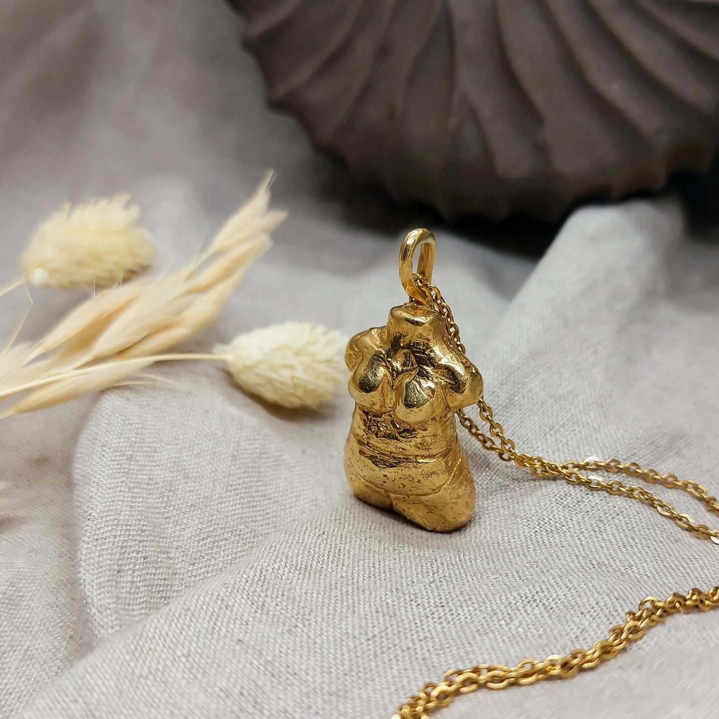 woman shaped pendant