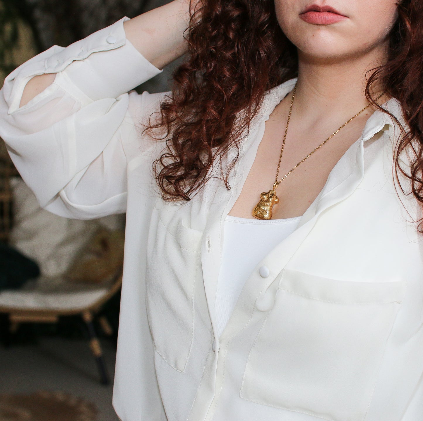 woman shaped pendant