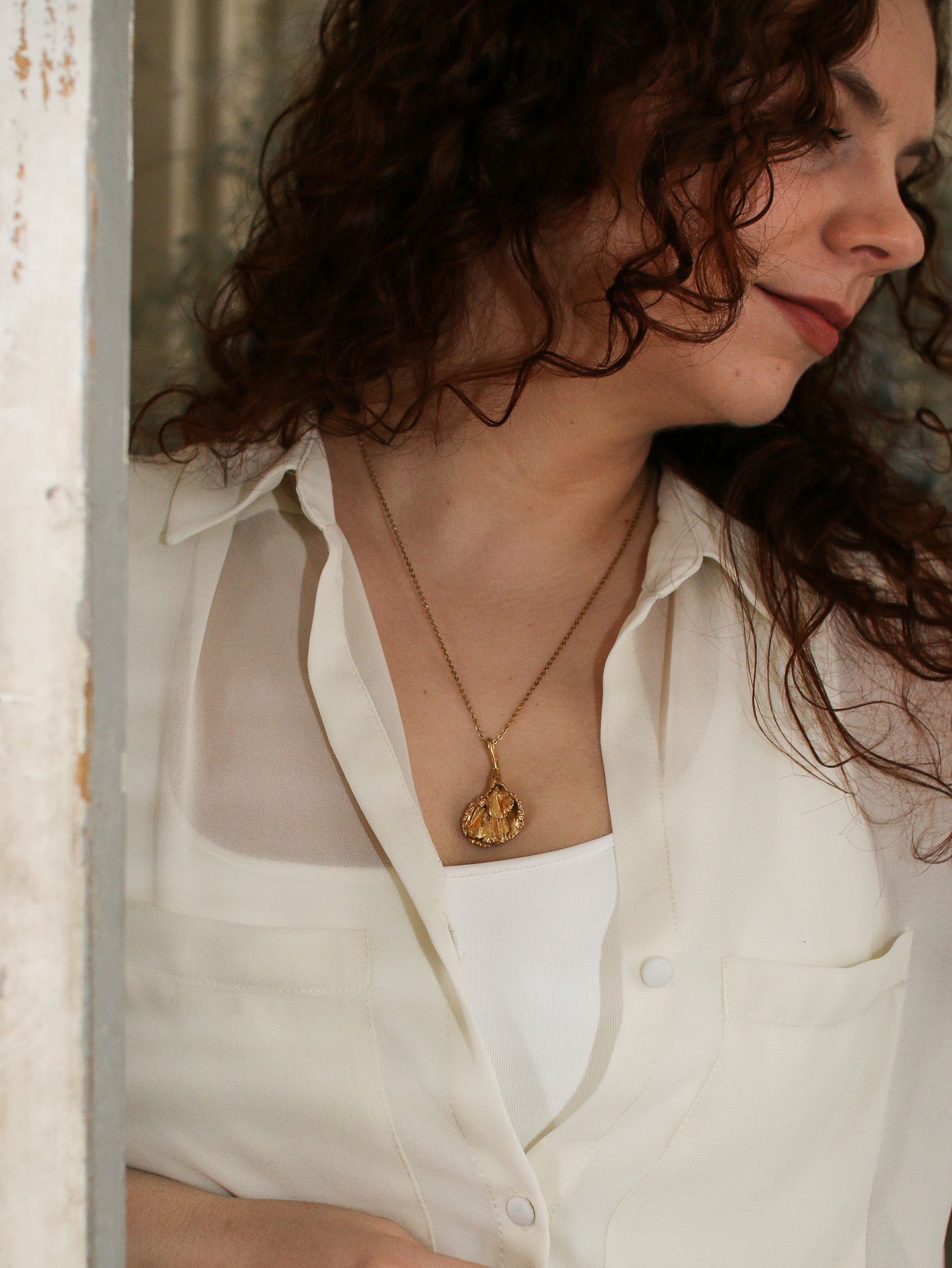 pendant representing femininity
