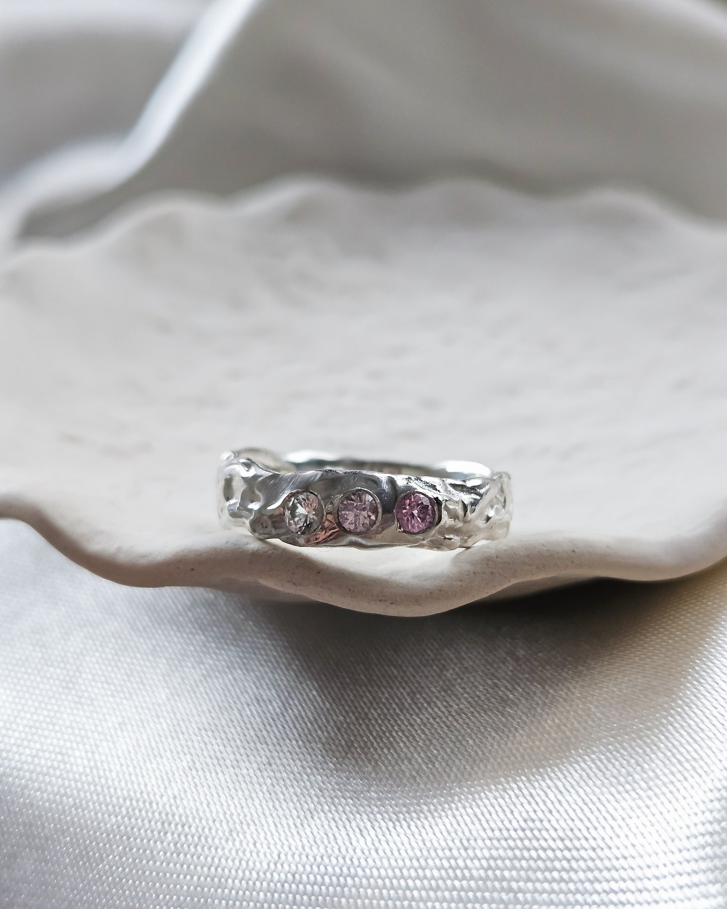Melted ring with pink sapphires