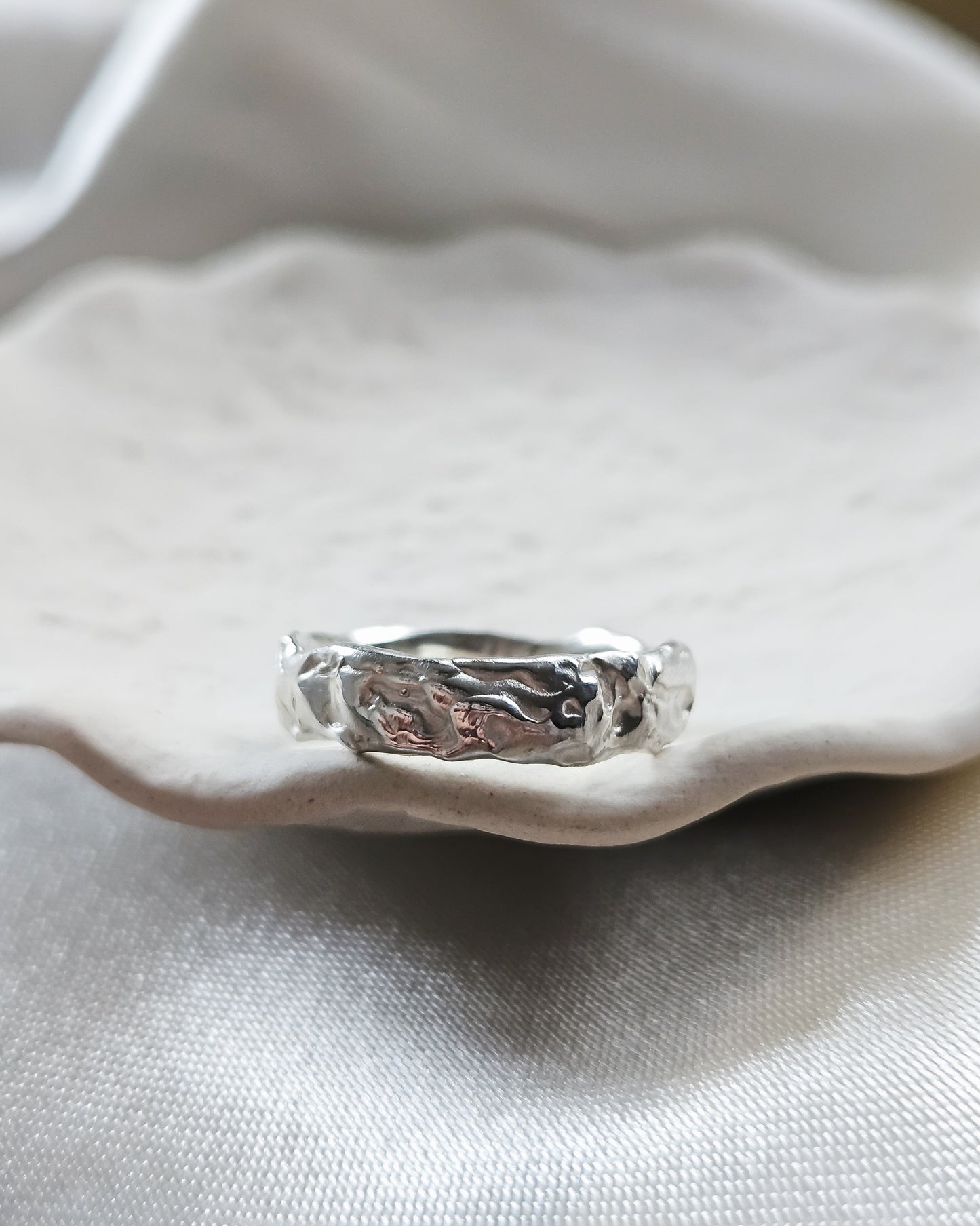 Melted ring with pink sapphires